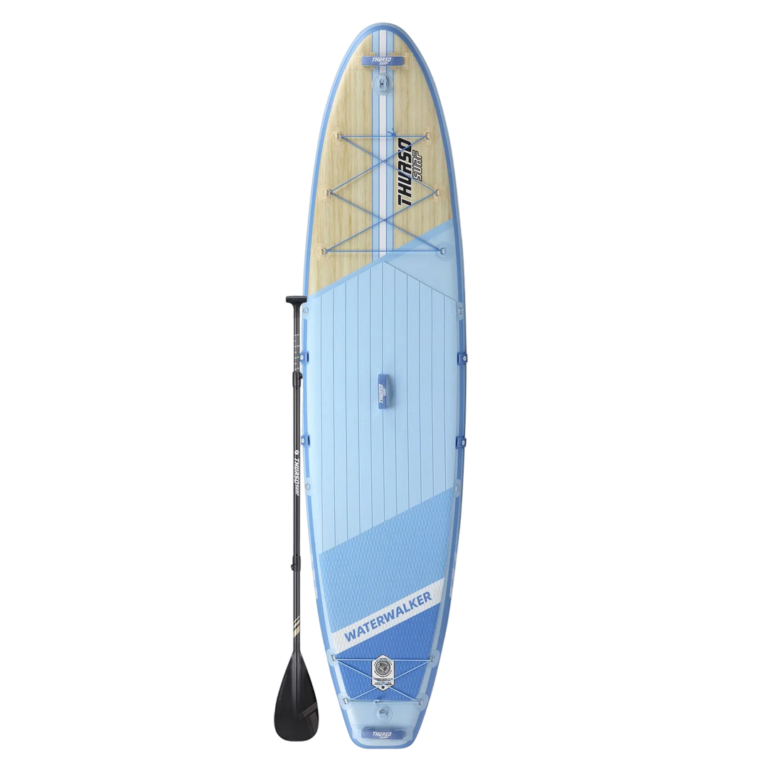 Blue and beige inflatable stand-up paddleboard with a paddle on a white background