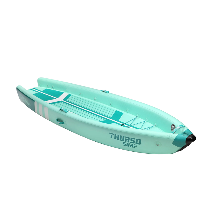 Turquoise inflatable kayak with 'Thurso Surf' branding on a white background