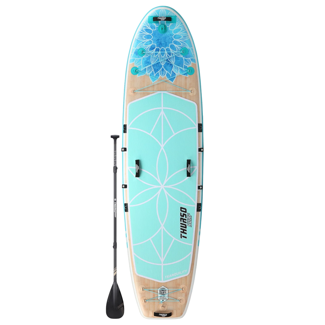 Stand-up paddleboard with floral design on a white background