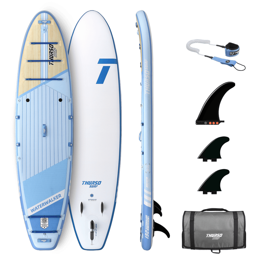 Paddleboard with accessories on a black background