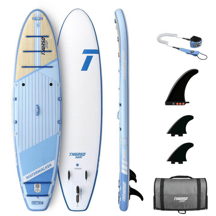 Paddleboard with accessories on a black background