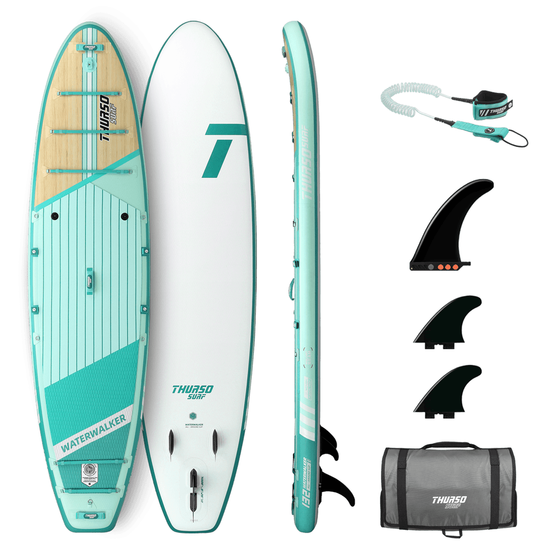 Turquoise and white paddleboard with accessories on a black background