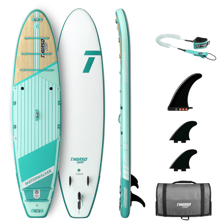 Turquoise and white paddleboard with accessories on a black background