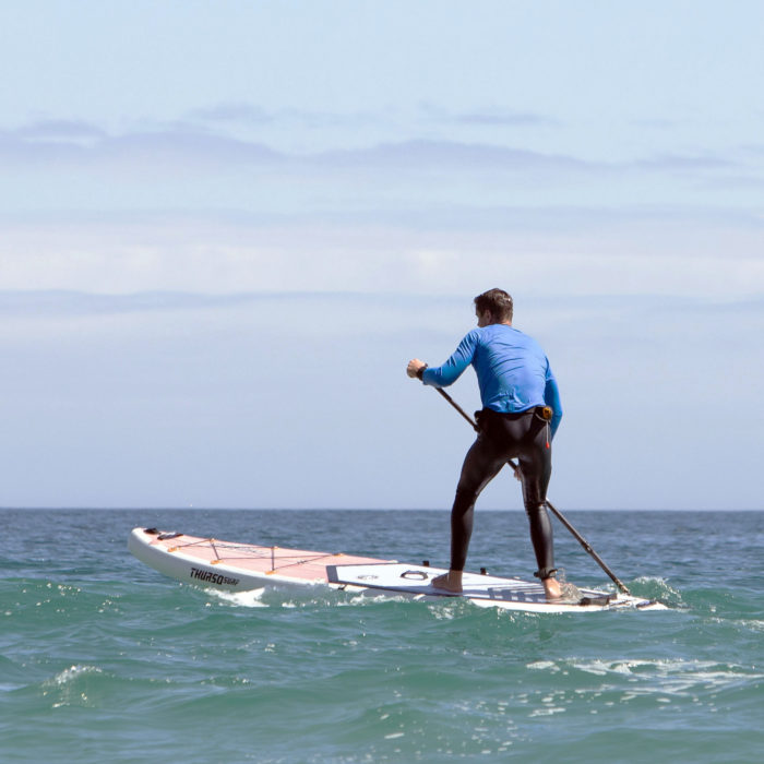touring sup board thurso surf expedition man pivot turn step back