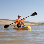 thurso surf waterwalker 126 SUP 2021 tangerine woman kayaking paddling